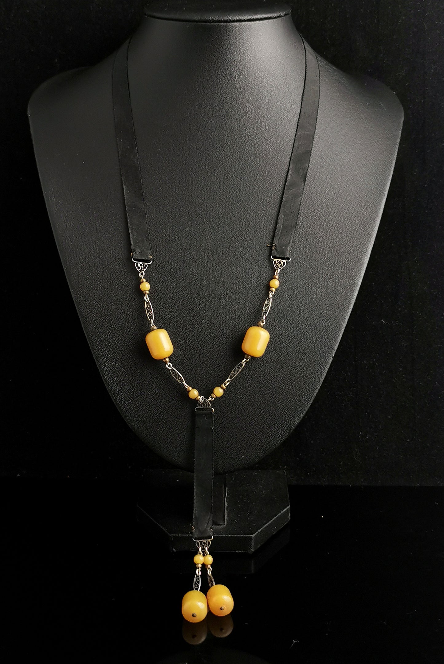 Antique Art Deco Sautoir necklace, black silk and butterscotch bead