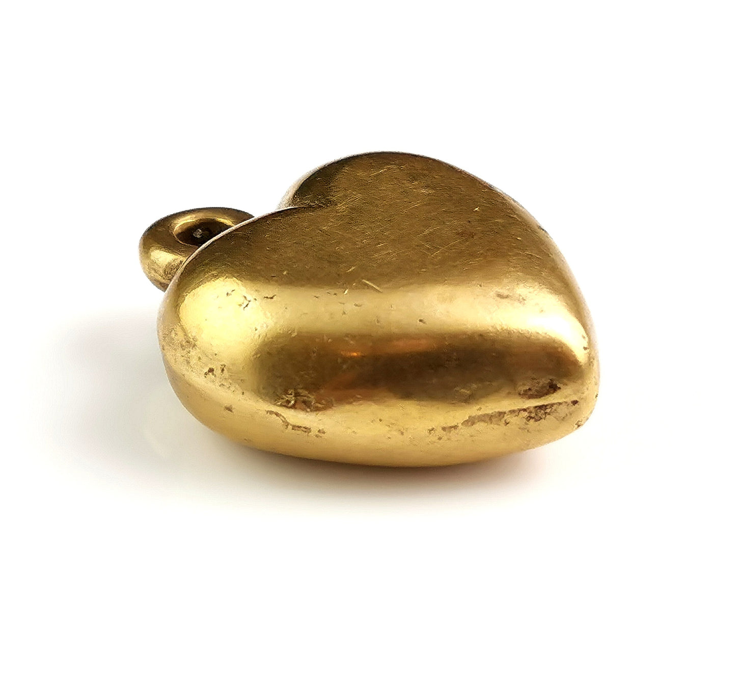 Antique Victorian brass puffy heart pendant