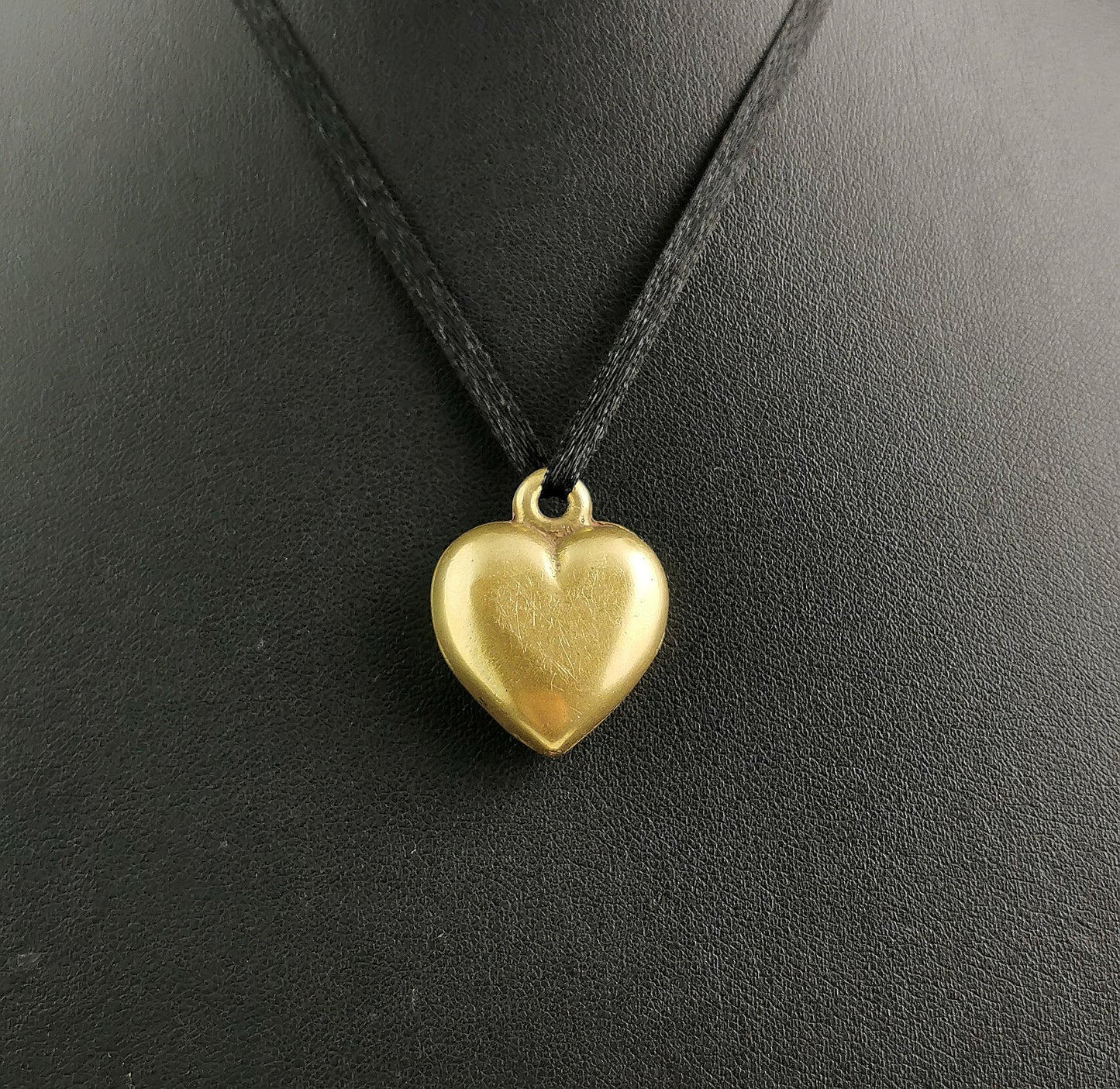 Antique Victorian brass puffy heart pendant